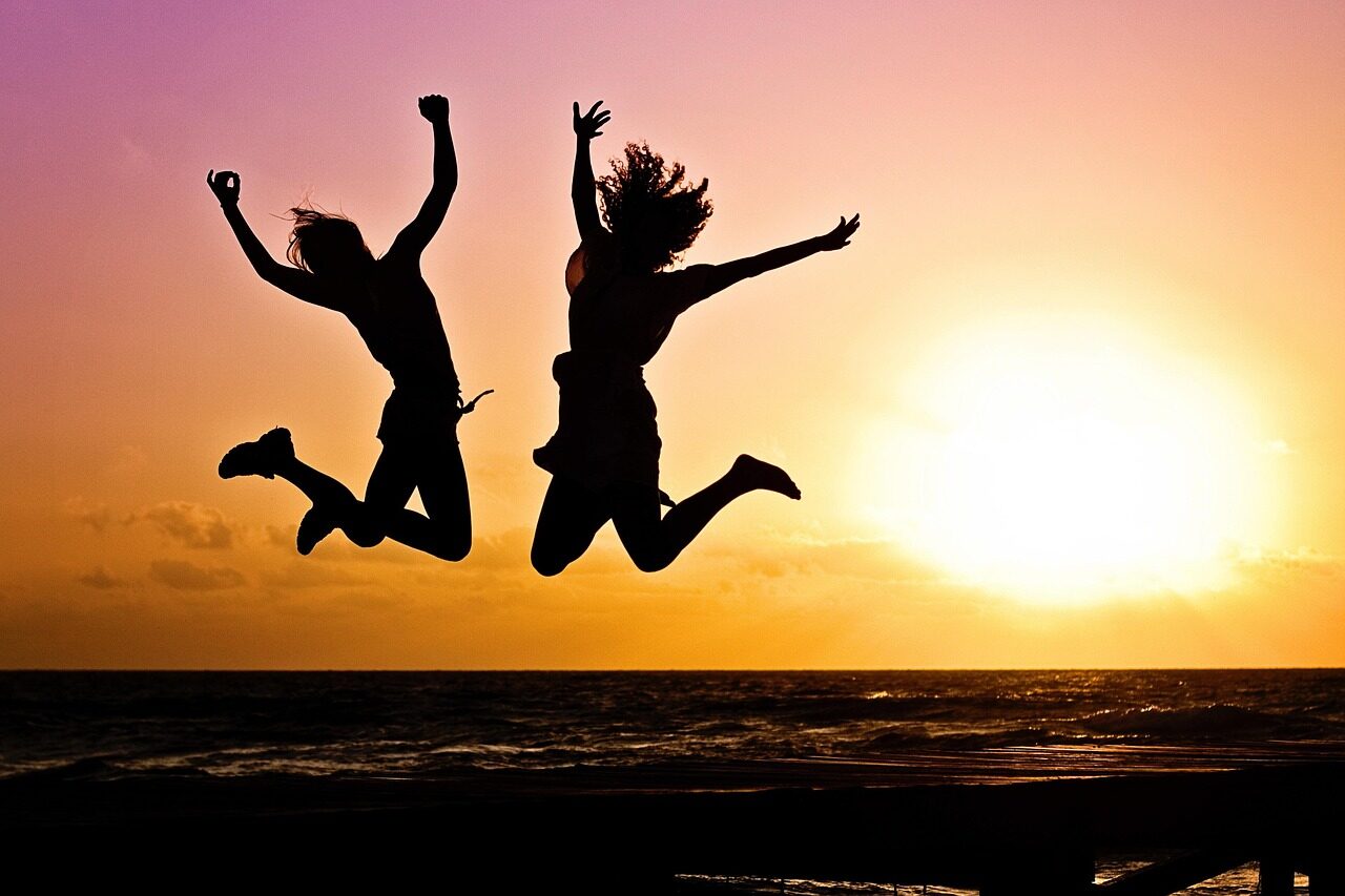 new year background, sunset, beach, silhouettes, jump, jumping, youth, active, happy, nature, pair, girls, young women, people, joy, freedom, seaside, dusk